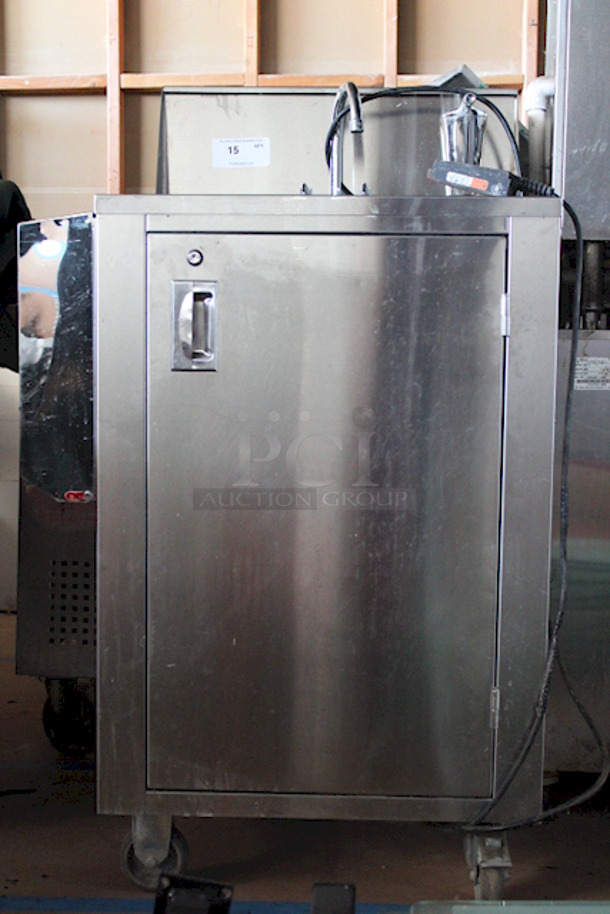 AMAZING! Crown Verity CV-PHS-4C Space Saver Single Bowl Cold Water Portable Hand Sink Cart. Includes: Electric Pump (120V), Hands Free Pump Saver Foot Pedal, Power Outlet, Soap Dispenser Holder and Paper Towel Dispenser. Allows For Hook-Up To City Water. On Commercial Casters. Keys Not Included. 25x24-1/4x47-3/4 

Condition is 9/10 - Lighting Makes It Difficult To Photograph - Image 2 of 12