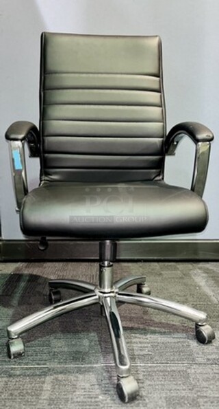 Item #60- Silver metal framed rolling office chair. Cushioned and ribbed black leather upholstery with armrests. A nice used piece! Measures 43” H x 22” W. 

