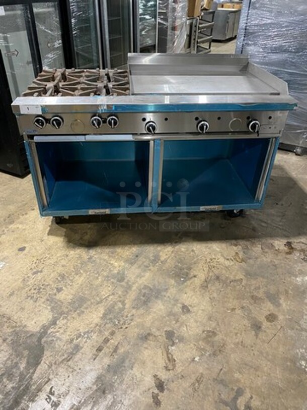 WOW! NEVER USED! Garland Commercial Natural Gas Powered 4 Burner Stove With Right Side Flat Griddle! Griddle Has Back And Side Splashes! With 2 Compartment Storage Space Underneath! All Stainless Steel! On Casters! Model: G604G36SS SN: 1712100102342