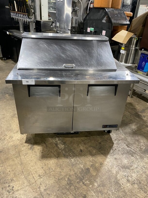 True Commercial Refrigerated Sandwich Prep Table! With 2 Door Underneath Storage Space! With Poly Coated Racks! All Stainless Steel! On Casters! Model: TSSU4818MB SN: 7025224 115V 60HZ 1 Phase