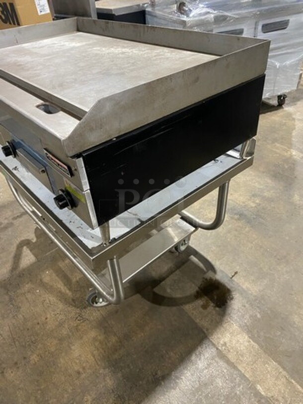 WOW! NEW! NEVER USED! Garland Commercial Countertop Electric Powered Flat Top Griddle! With Back And Side Splashes! On Legs! On Equipment Stand! All Stainless Steel! On Casters! Model: E2448G SN: 0404ME0033 208V 60HZ 3 Phase - Image 2 of 10