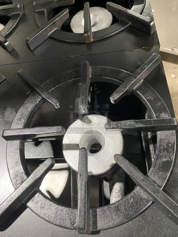 Southbend Commercial Natural Gas Powered 12 Burner Stove! With Raised Back Splash And Salamander Shelf! With 2 Full Size Oven Underneath! All Stainless Steel! On Casters! Working When Removed! - Image 6 of 12