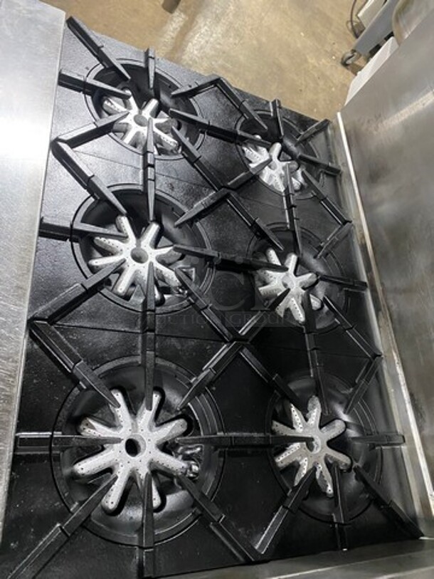 GREAT FIND! Garland Commercial Gas Powered 6 Burner Stove With Right Side Flat Griddle! Griddle Has Side Splashes! With Raised Back Splash And Salamander Shelf! With 2 Oven Underneath! Metal Oven Racks! All Stainless Steel! On Casters! - Image 7 of 11