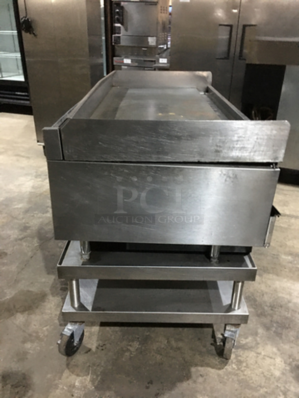GORGEOUS! Wolf Heavy Duty Commercial Flat Griddle! On Heavy Duty Equipment Stand! With Back And Side Splashes! All Stainless Steel! On Casters! Model: IRC60C SN: 481606006 120V 60HZ 1 Phase - Image 3 of 9