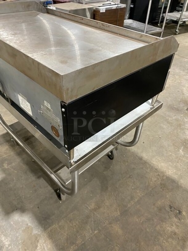 WOW! NEW! NEVER USED! Garland Commercial Countertop Electric Powered Flat Top Griddle! With Back And Side Splashes! On Legs! On Equipment Stand! All Stainless Steel! On Casters! Model: E2448G SN: 0404ME0033 208V 60HZ 3 Phase - Image 4 of 9