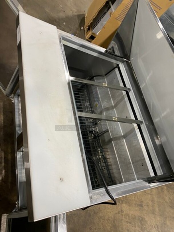 Universal Coolers Commercial Refrigerated Sandwich Prep Table! With Commercial Cutting Board! With 2 Door Storage Space Underneath! With Poly Coated Rack! All Stainless Steel! On Casters! - Image 8 of 9