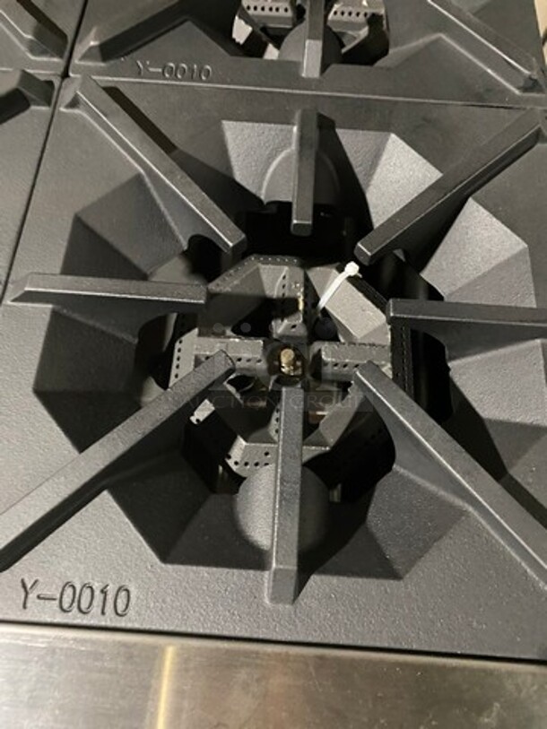 AWESOME! NEW! Migali Commercial Natural Gas Powered 4 Burner Stove With Flat Griddle! Flat Griddle Has Side Splashes! With Raised Back Splash And Salamander Shelf! With 2 Oven Underneath! Metal Oven Racks! All Stainless Steel! On Casters! Model: CRO424GLNG SN: NGUSB100321071000920017 - Image 7 of 12