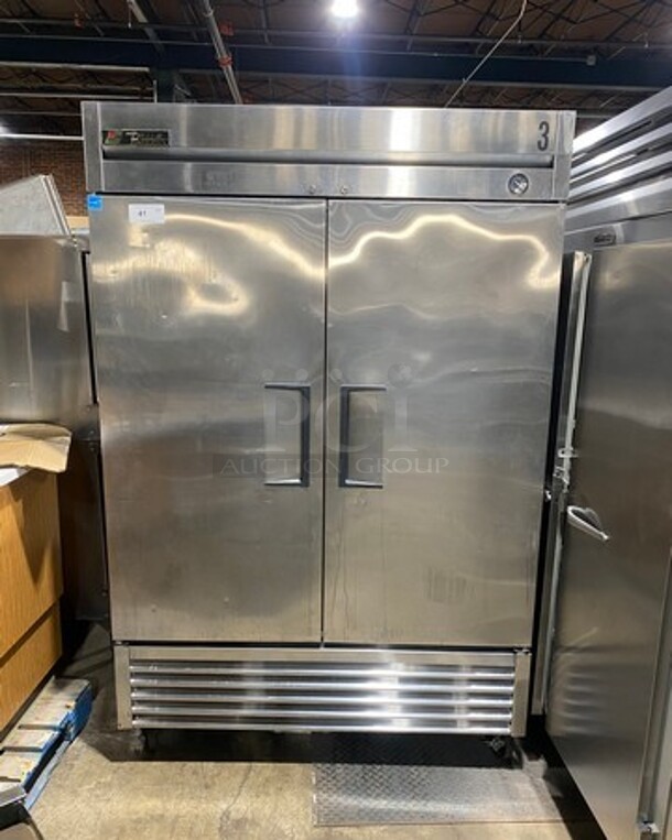 True Commercial 2 Door Reach In Freezer! With Poly Coated Racks! All Stainless Steel! On Casters! Model: T49F SN: 7196976 115V 60HZ 1 Phase