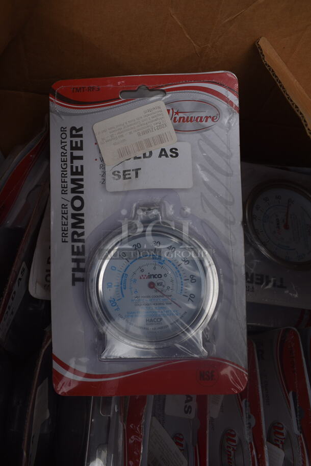24 BRAND NEW! Sets of Winware Thermometers; One Cooler / Freezer Thermometer and One Oven Thermometer. Total of 48 Thermometers. 24 Times Your Bid!