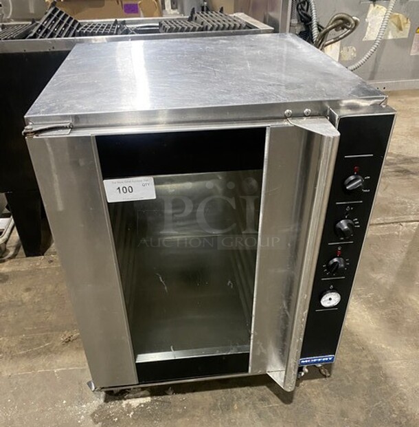 WOW! Moffat Turbofan - Full Size Sheet Pan Manual Electric Proofer And Holding Cabinet! P Series! 8 x full size sheet pan capacity 3" tray spacing Low velocity circulation fan Off / proofer / hold mode selection dial Mechanical thermostat 65-185F Air heating ON control panel indicator Humidity level control Humidity tank ON control panel indicator Cabinet temperature thermometer Auto-fill water system standard Single phase connection! Model: P8M SN: 1667319 - Image 1 of 8