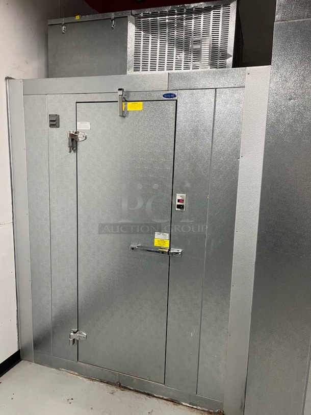 6'x5'x7' Norlake SELF CONTAINED Walk In Freezer Box w/ Floor, Norlake Model CPF100DC-A Condenser and Emerson Compressor. 208-230 Volts, 1 Phase. Picture of the Unit Before Removal Is Used As Gallery Picture