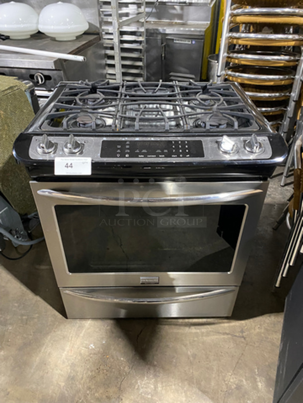 Frigidaire 4 Burner Stove! With Oven Underneath! Metal Oven Racks! all Stainless Steel! Model: FGGS3065PFU SN: AF75003176