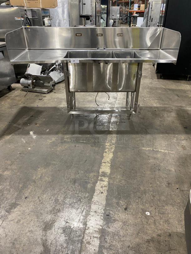 GREAT! Commercial 3 Bay Dish Sink! With Dual Side Drain Boards! With Raised Back And Side Splashes! All Stainless Steel! On Legs!