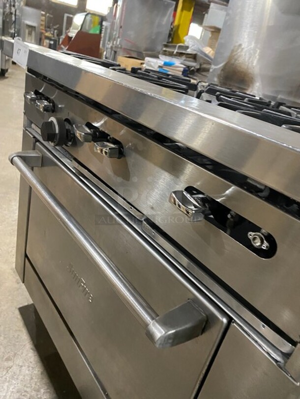 Nice! Sunfire All Stainless Steel Natural Gas 6 Burner Stove! With an Underneath Full Size Stove! Raised Back Splash And Salamander Shelf! On Casters! - Image 9 of 9