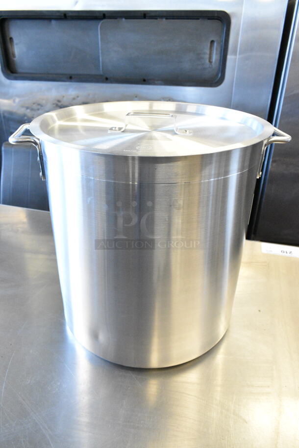BRAND NEW SCRATCH AND DENT! Choice  Standard Weight Aluminum Stock Pot with Steamer Basket and Cover w/ 471ASTB40 Choice 40 Qt. Aluminum Stock Pot Steamer Basket.  - Image 1 of 7