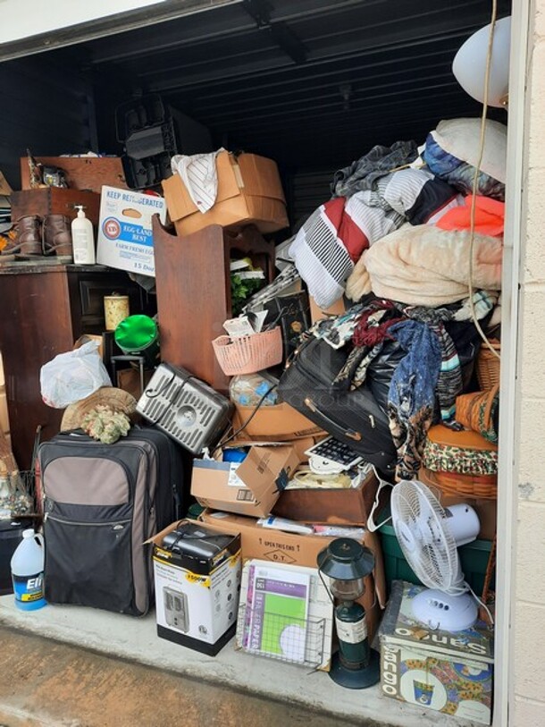 ALL ONE MONEY! Lot of Entire Contents of Storage Unit #29. Unit Size: 10 x 20. Unit Appears to Contain: Dressers, Bookshelves, Box Spring & Mattress, Wooden Bed, Couch, Chairs, Tables, Fan, Heaters, Bottle of Buttons, Longaberger Baskets, Lights, Mirror, Ironing Board, Rugs, Suitcases, Trashcan, Keurig, Blankets, Clothes, Shoes, Kerosene Heater, Large Stuffed Giraffe, Fake Plants, Bags, Totes & Boxes. Cleaning Deposit of $100 per Unit Paid on Pickup Day. Winner Has 7 Days From Close of Auction to Remove Items. All Items Must Be Removed and Unit Must Be Broom Swept to Get Cleaning Deposit Returned. Invoice and Cleaning Deposit Must Be Paid In Full by 4:00pm Tuesday, March 7th. Unit Must Be Cleared Out By 4:00pm Monday, March 13th. Please Come Into The Office To Settle Your Invoice and You Will Be Taken To Your Storage Unit for Cleanout. If You Plan To Clear Out Your Unit Saturday or Sunday You Need To Report To Our Office During The Week Before 4:00pm To Gain Access To Your Unit As Our Office Is Closed On Weekends. - Image 2 of 12