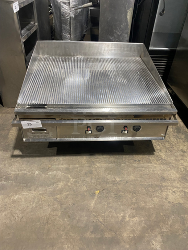 Keating Commercial Countertop Natural Gas Powered Grill! With Mirror Shine Grooved Grill! With Back And Side Splashes! All Stainless Steel! On Legs! Model: 36X36FLD SN: GG43239 - Image 1 of 9