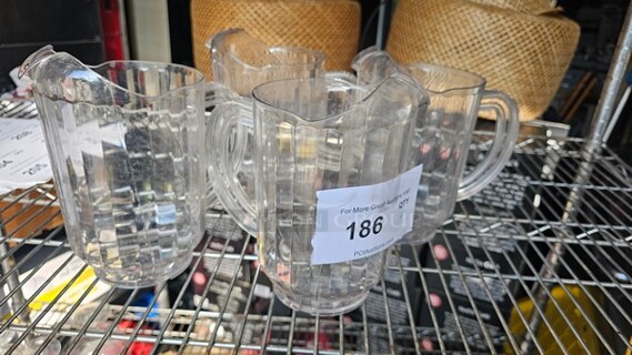 Lot of 4 Plastic Pitchers