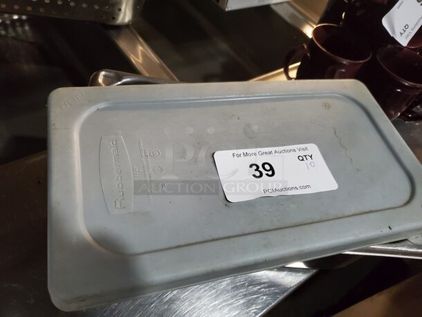 Lot of 10 Rubbermaid Plastic Lids
13 x 7 - Image 1 of 4