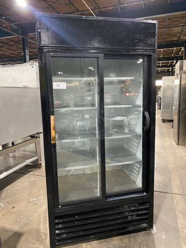 True Commercial 2 Sliding Door Reach In Refrigerator Merchandiser! With View Through Doors! With Poly Coated Racks! Model: GDM33 SN: 1671410 115V 60HZ 1 Phase