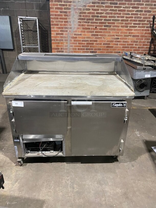 Leader Commercial Refrigerated Pizza Prep Table! With 2 Door Underneath Storage Space! All Stainless Steel! With Commercial Cutting Board! Model DR48SC Serial PT034266! 115V 1Phase! On Casters! - Image 1 of 10
