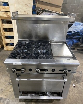 Us Range Stainless Steel Commercial Natural Gas Powered 4 Burner Range w/ Right Side Flat Top Griddle With Oven! Over Shelf And Back Splash! On Legs!