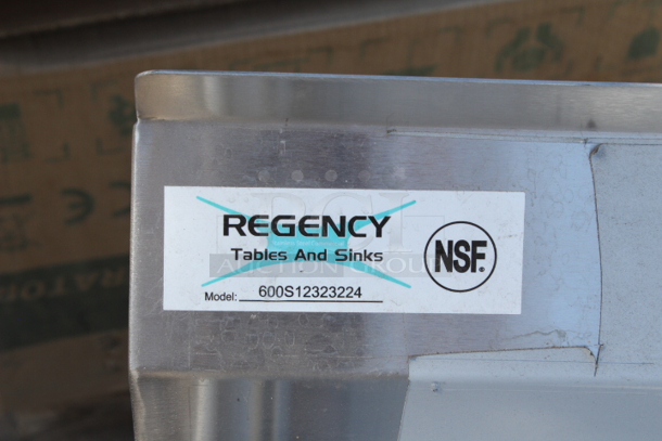 BRAND NEW SCRATCH & DENT! Regency 600S123232G 71" 16 Gauge Stainless Steel One Compartment Commercial Sink with Galvanized Steel Legs, Drain and 2 Drainboards - 23" x 23" x 12" Bowl Sink only. Out of original packaging.  - Image 4 of 6