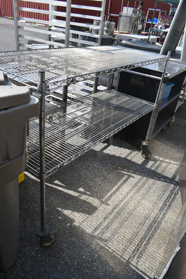 Chrome Finish 2 Tier Wire Shelving Unit on Commercia Casters. BUYER MUST DISMANTLE. PCI CANNOT DISMANTLE FOR SHIPPING. PLEASE CONSIDER FREIGHT CHARGES. - Image 1 of 5