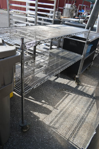 Chrome Finish 2 Tier Wire Shelving Unit on Commercia Casters. BUYER MUST DISMANTLE. PCI CANNOT DISMANTLE FOR SHIPPING. PLEASE CONSIDER FREIGHT CHARGES.