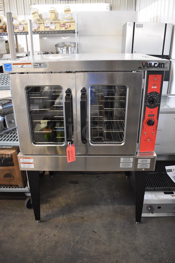 BRAND NEW! Vulcan Model VC5ED Stainless Steel Commercial Electric Powered Full Size Convection Oven w/ View Through Doors, Metal Oven Racks and Thermostatic Controls on Metal Legs. 208 Volts, 3/1 Phase. 40.5x31.5x55