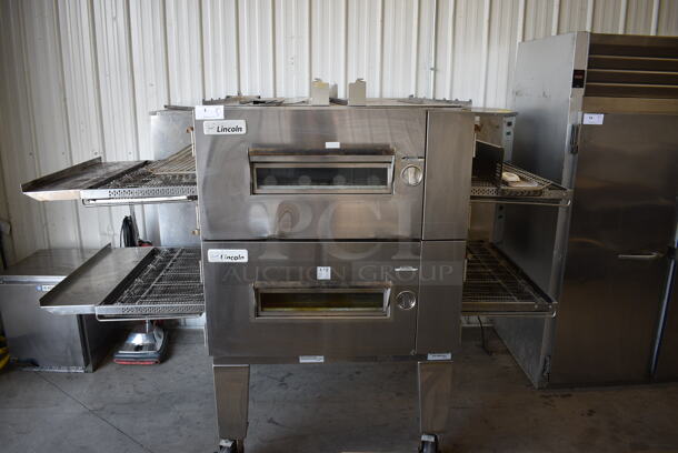 2 2014 Lincoln Impinger Model 1600-000-U-K1968 Stainless Steel Commercial Natural Gas Powered Conveyor Pizza Ovens on Commercial Casters. 110,000 BTU. 92x60x65. 2 Times Your Bid!