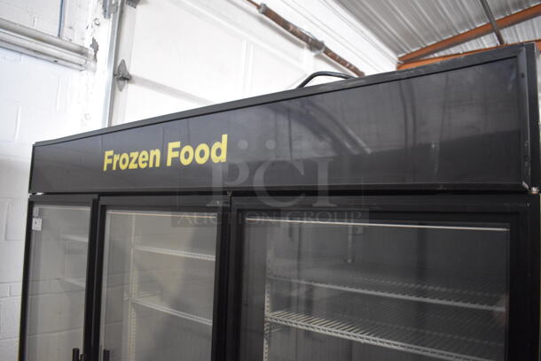 2014 True GDM-72F-LD Commercial Free Standing Electric Powered Triple Swing Glass Door Merchandiser Freezer In Black With Polycoated Racks. 115V/1 Phase Could Not Test Due To Different Plug Style - Image 4 of 8