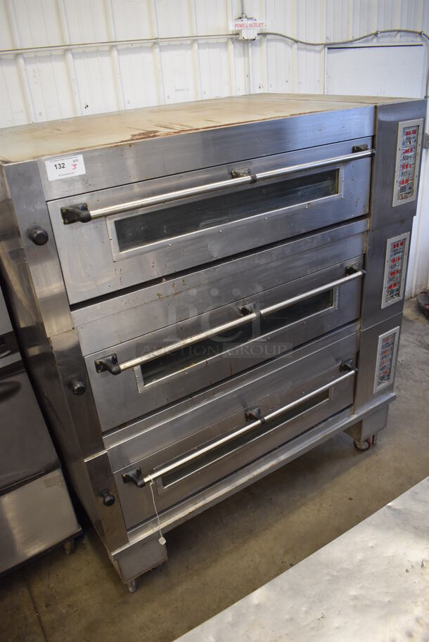 3 Stainless Steel Commercial Electric Powered Single Deck Bakery Ovens on Commercial Casters. 208-240 Volts, 3 Phase. 65x43.5x73. 3 Times Your Bid!
