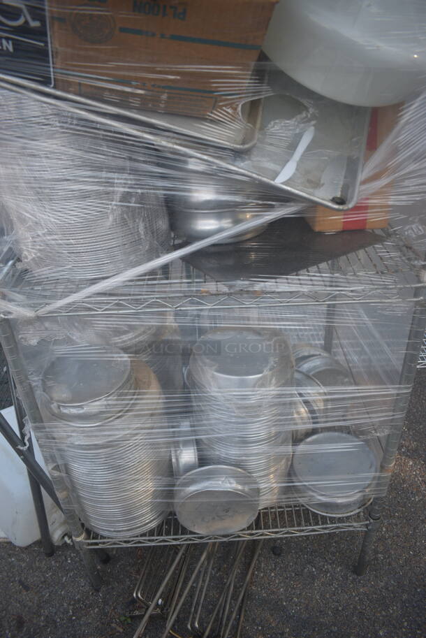 ALL ONE MONEY! Lot of Items including Open Utility Shelf With Metro Style Shelving, Sheet Pans, Round Steel Tins, Sugar Packets, Men's Room Sign, Coffee Decanter AND MORE!BUYER MUST DISMANTLE. PCI CANNOT DISMANTLE FOR SHIPPING. PLEASE CONSIDER FREIGHT CHARGES. - Image 3 of 5