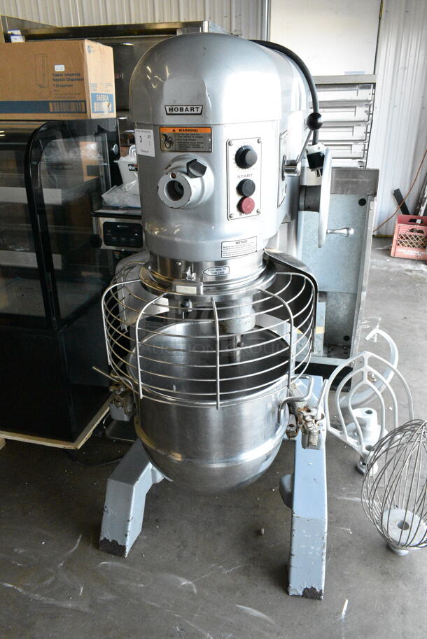 Hobart H-600T Metal Commercial Floor Style 60 Quart Planetary Dough Mixer w/ 2 Stainless Steel Mixing Bowl, Bowl Guard, Bowl Dolly, Whisk, Paddle and Dough Hook Attachments. 200 Volts, 3 Phase. - Image 1 of 6