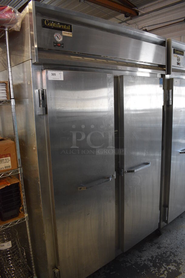 Continental Model 2F Stainless Steel Commercial 2 Door Reach In Freezer on Commercial Casters. 115 Volts, 1 Phase. 52x34x82. Tested and Powers On But Does Not Get Cold