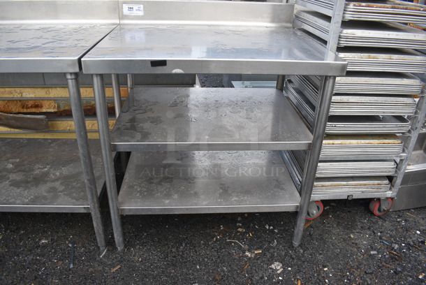 Stainless Steel Commercial Table w/ Back Splash and 2 Under Shelves. 36x30x41
