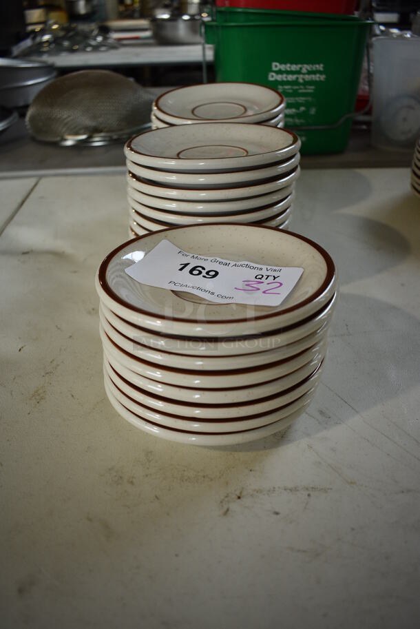 32 White Ceramic Saucers w/ Brown Lines. 5.5x5.5x1. 32 Times Your Bid!