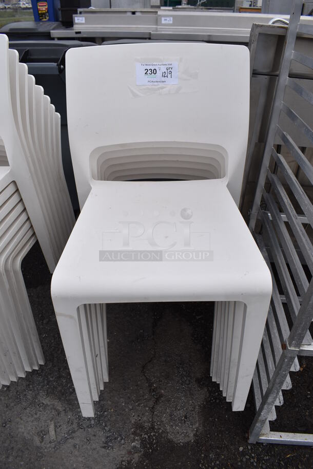 7 Arper White Poly Dining Chairs. 17.5x18x31. 7 Times Your Bid!