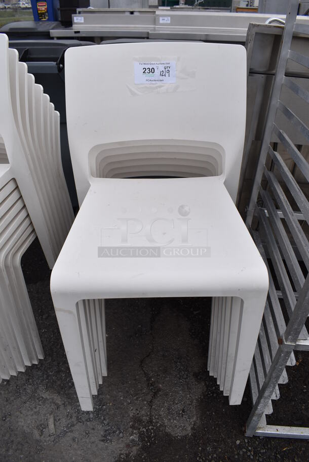7 Arper White Poly Dining Chairs. 17.5x18x31. 7 Times Your Bid! - Image 1 of 4