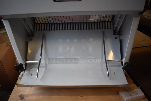 BRAND NEW SCRATCH AND DENT! Estella 348BSLICE58 Metal Commercial Countertop 5/8" Thickness Bread Slicer. 110 Volts, 1 Phase. 25x25x28. Tested and Working! - Image 5 of 10
