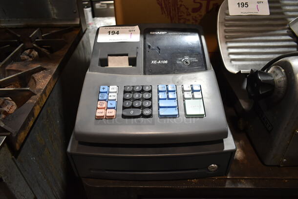 Sharp XE-A106 Countertop Electronic Cash Register. 