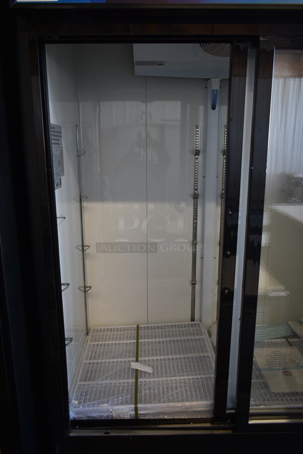 BRAND NEW SCRATCH AND DENT! 2023 KoolMore MDR-2D-GSLD Metal Commercial 2 Door Reach In Cooler Merchandiser w/ Poly Coated Racks on Commercial Casters. 115 Volts, 1 Phase. Tested and Working! - Image 5 of 9