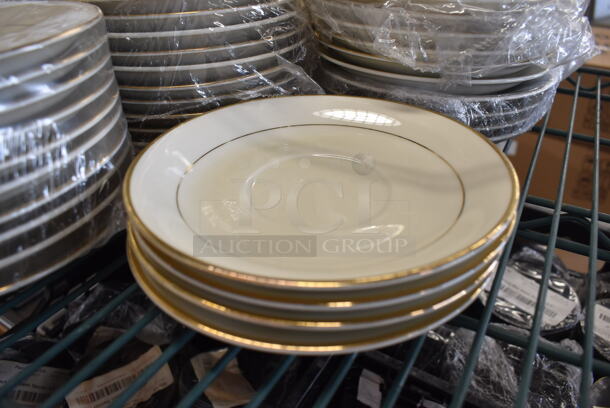 ALL ONE MONEY! Lot of 84 White Ceramic Saucers w/ Gold Lines on Rim. 6.5x6.5x1