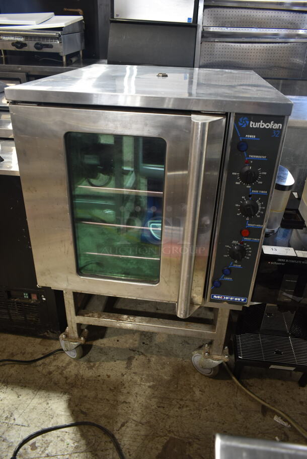 Moffat Turbofan E32MS Stainless Steel Commercial Full Size Electric Touch Screen Convection Oven with Steam Injection on Equipment Stand w/ Commercial Casters 220-240 Volts. 