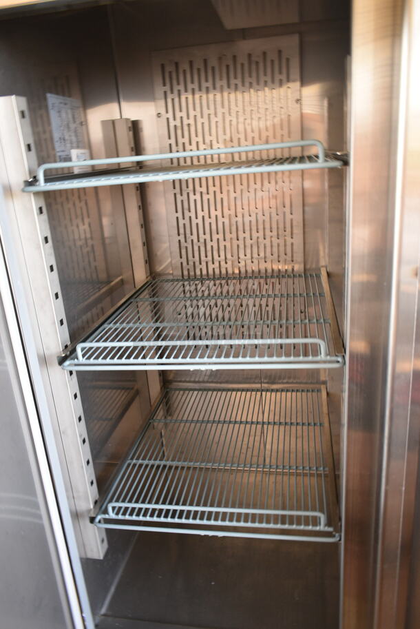 Avantco 178SS3FHC Stainless Steel Commercial 3 Door Reach In Freezer w/ Poly Coated Racks on Commercial Casters. 115 Volts, 1 Phase. Tested and Powers On But Does Not Get Cold - Image 5 of 9
