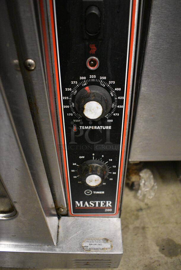 2 Garland Master 200 Stainless Steel Commercial Natural Gas Powered Full Size Convection Ovens w/ View Through Doors, Metal Oven Racks and Thermostatic Controls on Commercial Casters. 38x45.5x68. 2 Times Your Bid! - Image 7 of 7