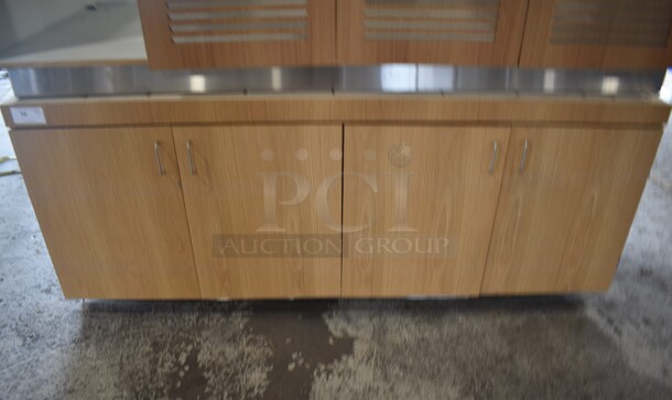 BRAND NEW! Wood Pattern 4 Door Counter. Missing Countertop. - Image 1 of 5