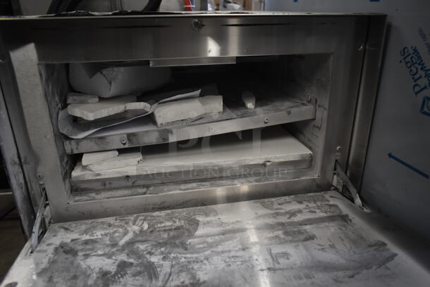 BRAND NEW SCRATCH AND DENT! Vollrath POA 8002 40848 Stainless Steel Commercial Countertop Electric Pizza Oven with 2 Ceramic Decks. See Pictures for Broken Cooking Stones. 208-240 Volts, 1 Phase.  - Image 4 of 7