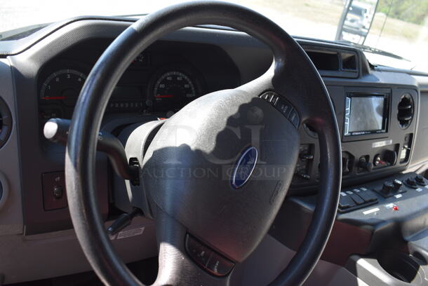 2011 Ford Ecoline Passenger Bus. Odometer Reads 29,039. VIN 1FDFE4FS5BDB14627. Title In Hand. The bus is a 14-passenger, with a space for a wheelchair to fasten to the floor. Vehicle Runs and Drives But Battery Needs To Be Reconnected. See Lot #12 For Additional Pictures - Image 11 of 12